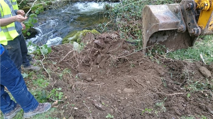 Excavating the trench for the turbine outflow pipe returning the water to the river 11 May 2015