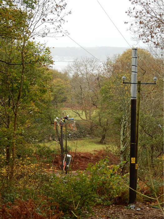 Scottish Power contractors working to upgrade the powerlines above the village 16 November 2015 Scottish Power contractors working to upgrade the powerlines above the village 16 November 2015
