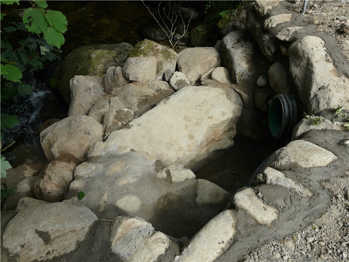 The outlet returning water from the turbine to the river nears completion 13 Aug 2015 The outlet returning water from the turbine to the river nears completion 13 Aug 2015