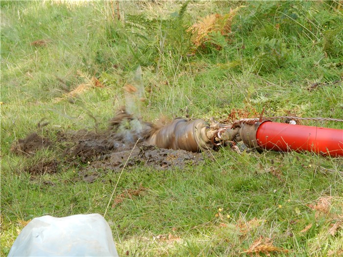 The drill rods and spinning reversing head are withdrawn dragging the cable duct back under the river 9 Sept 2015