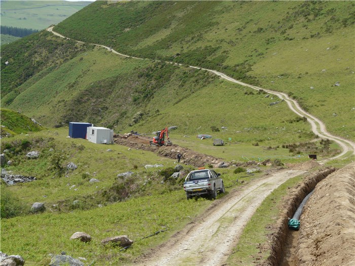 The first section of pipe is laid on the north bank of the Afon Anafon 16 June 2015 The first section of pipe is laid on the north bank of the Afon Anafon 16 June 2015